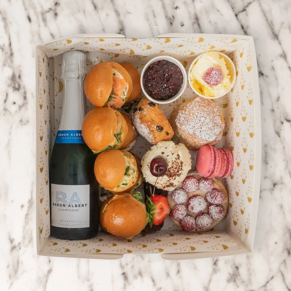 Orange Pekoe afternoon tea packed in a takeaway box